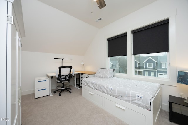 carpeted bedroom featuring ceiling fan and lofted ceiling