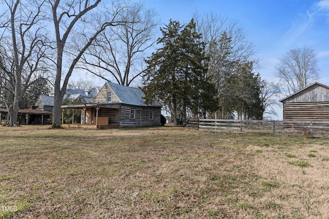 view of yard with an outdoor structure