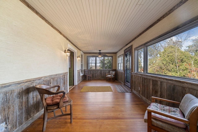 sunroom featuring wooden ceiling