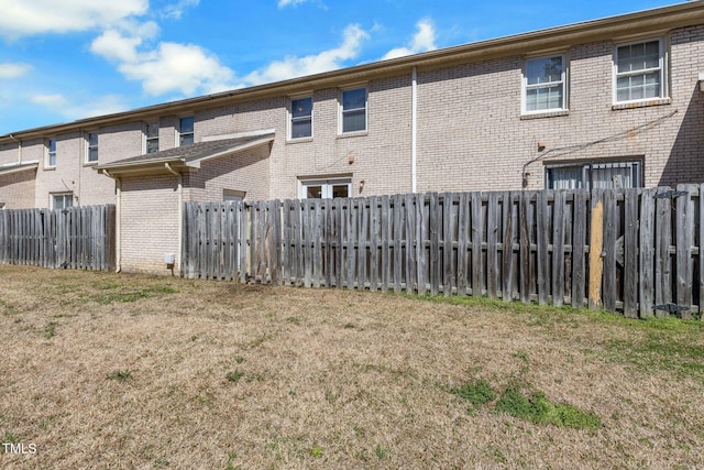 exterior space with a fenced backyard