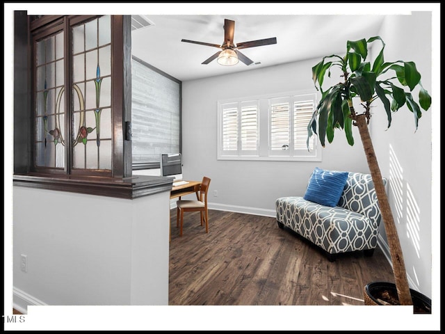 office with a ceiling fan, wood finished floors, and baseboards