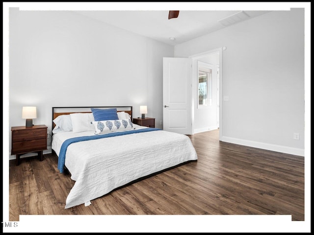 bedroom with ceiling fan, visible vents, baseboards, and wood finished floors