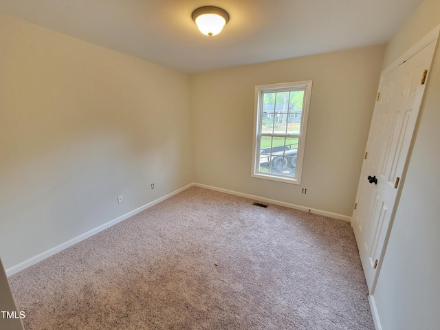 unfurnished bedroom featuring carpet floors