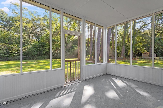 unfurnished sunroom with a wealth of natural light