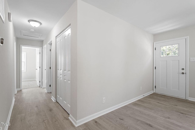 foyer entrance featuring light wood-type flooring