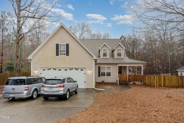 front facade featuring a garage and covered porch