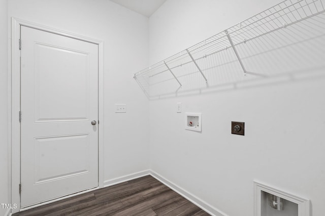 laundry area featuring dark wood-type flooring, hookup for a washing machine, and electric dryer hookup