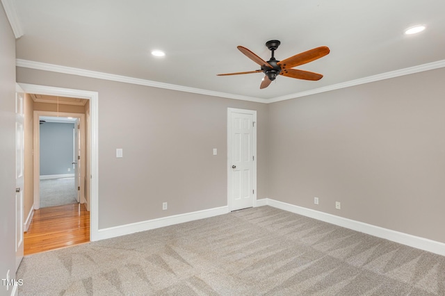 unfurnished bedroom with baseboards, attic access, carpet floors, ornamental molding, and recessed lighting