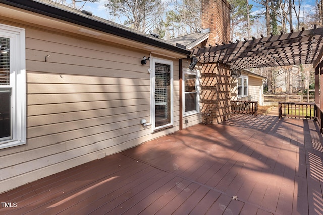 wooden deck with a pergola