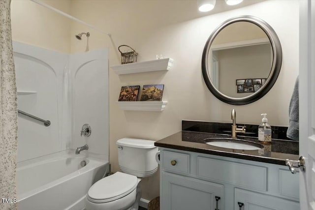 full bath with toilet, shower / washtub combination, and vanity