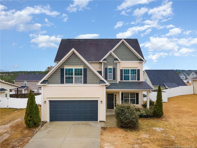 craftsman house with a garage