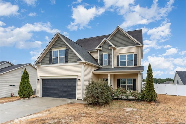 craftsman house with a garage