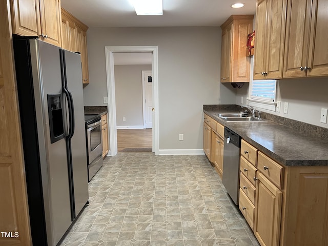 kitchen featuring appliances with stainless steel finishes and sink