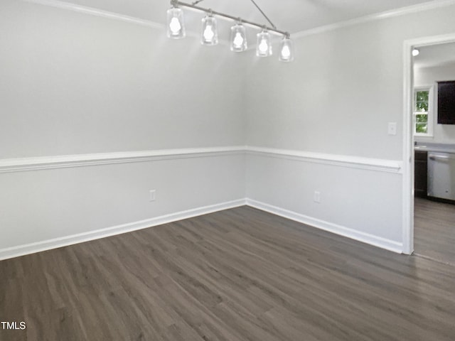 1599 Rogers Pointe Ln, Creedmoor, NC 27522 - unfurnished dining area with dark wood-style floors and crown molding