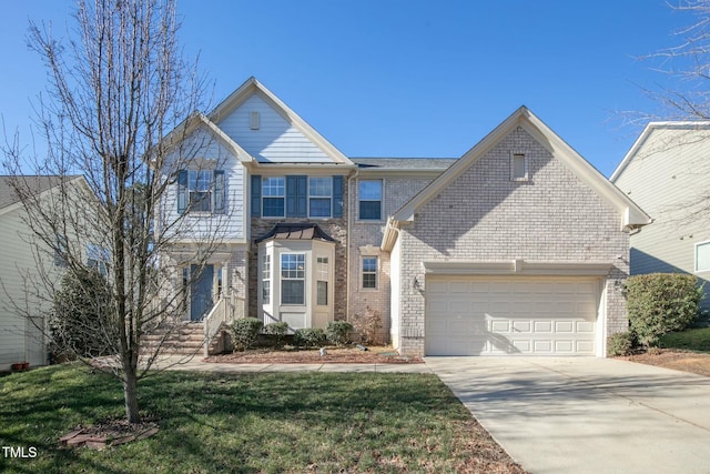 traditional-style house featuring concrete driveway, brick siding, an attached garage, and a front yard