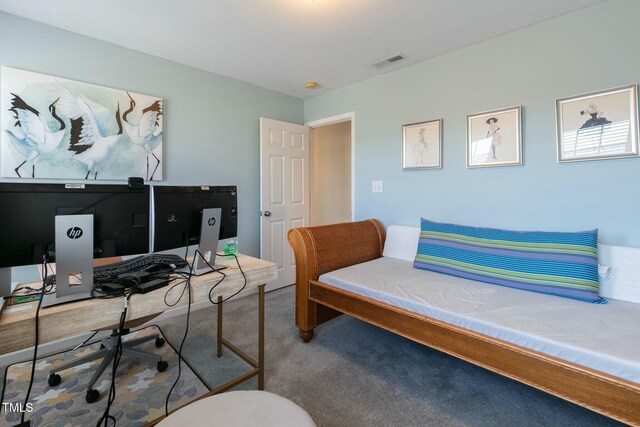 home office featuring carpet and visible vents