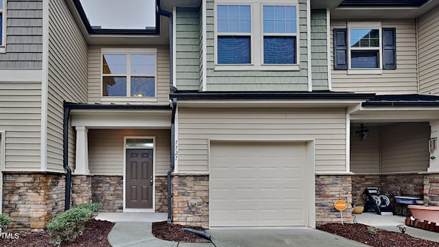 view of front of property with a garage