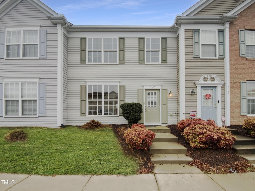 5107 Tomasita Ct, Raleigh, NC 27616 - townhome / multi-family property with a front yard