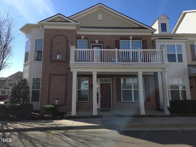 view of front of house with a balcony