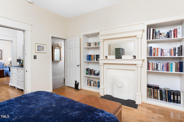 bedroom with light hardwood / wood-style flooring