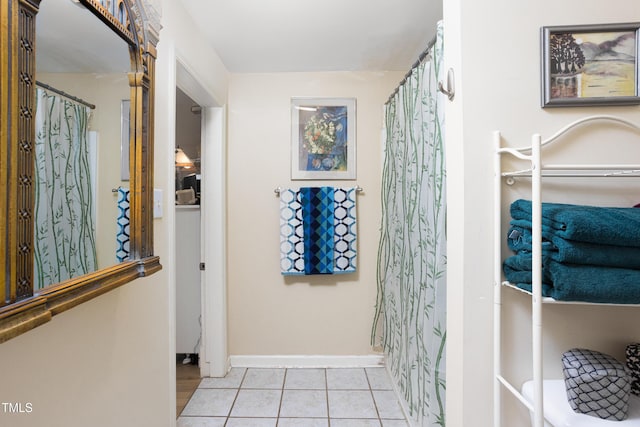 bathroom with tile patterned flooring