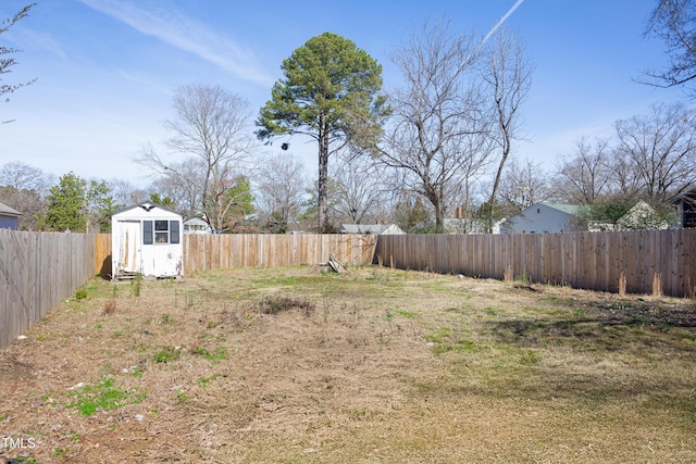 view of yard with a storage shed