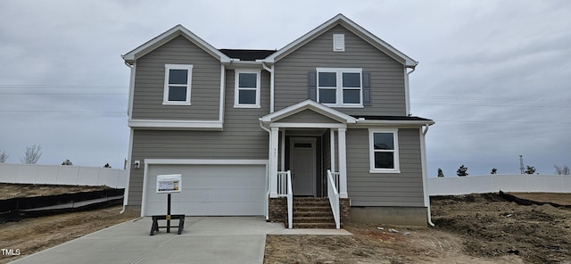 view of front of property with a garage