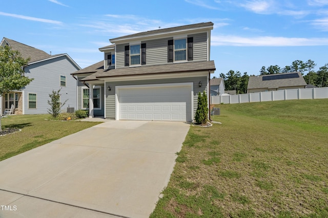 view of front facade with a garage and a front lawn