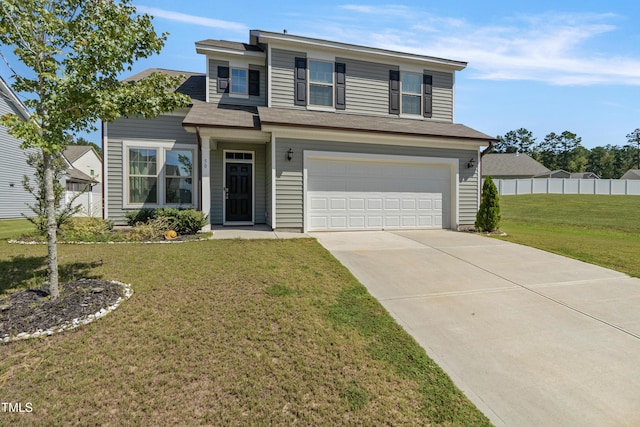 view of front of property with a garage and a front yard