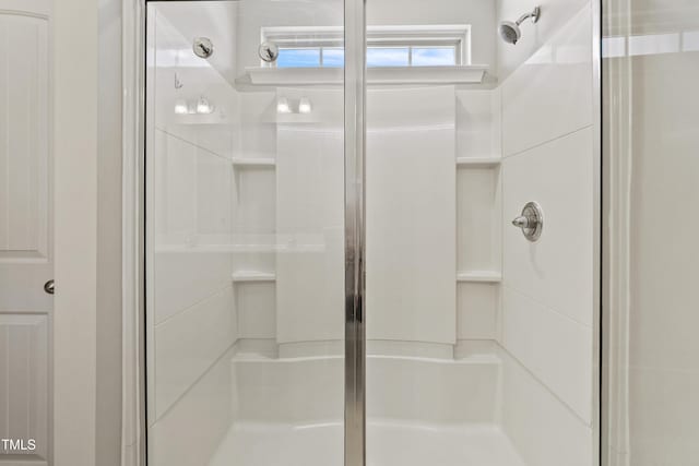 bathroom featuring an enclosed shower