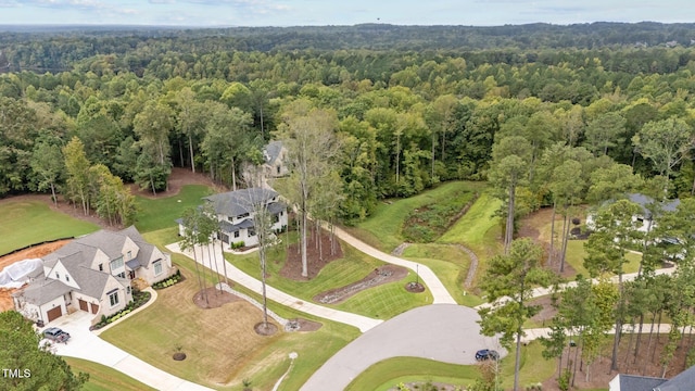 bird's eye view with a view of trees