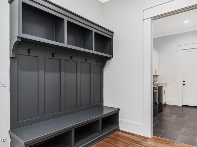 mudroom featuring baseboards, dark wood-style flooring, and recessed lighting