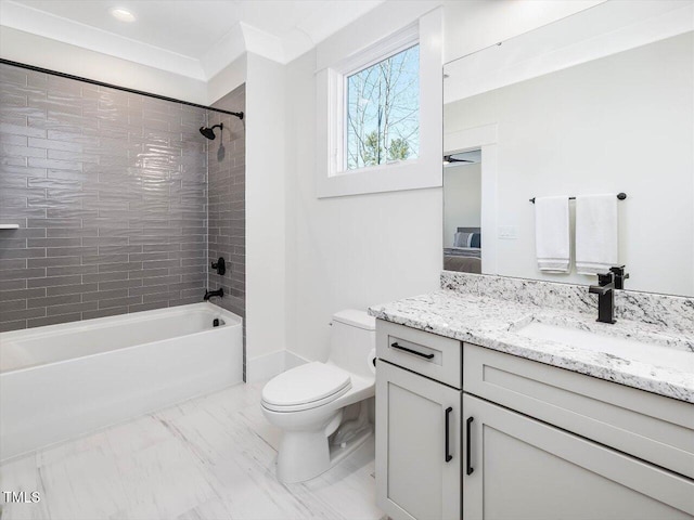 ensuite bathroom featuring ensuite bathroom, toilet, vanity,  shower combination, and marble finish floor