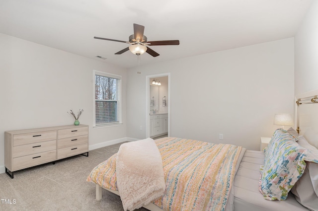 349 Shadow Falls Dr, Wendell, NC 27591 - bedroom with light colored carpet, baseboards, a ceiling fan, and connected bathroom