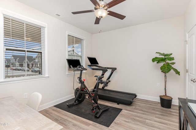 349 Shadow Falls Dr, Wendell, NC 27591 - workout area featuring a ceiling fan, light wood-style flooring, and baseboards