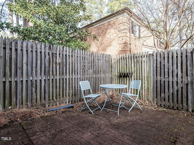 view of patio with fence