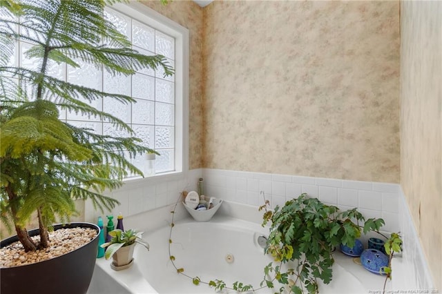 bathroom with a bathing tub