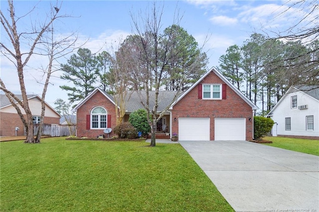 view of front of home featuring a garage and a front lawn