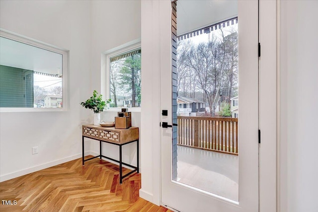 entryway featuring light parquet floors