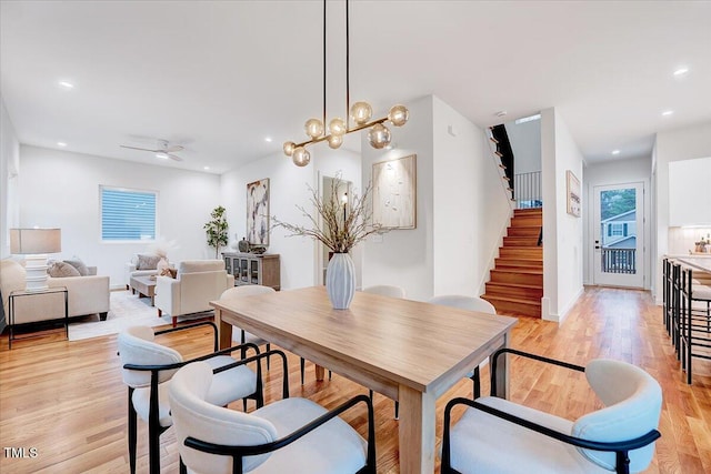 dining space with light hardwood / wood-style floors