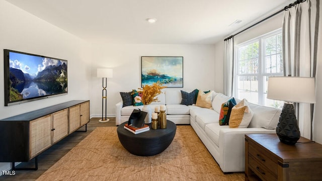 living room featuring dark hardwood / wood-style flooring