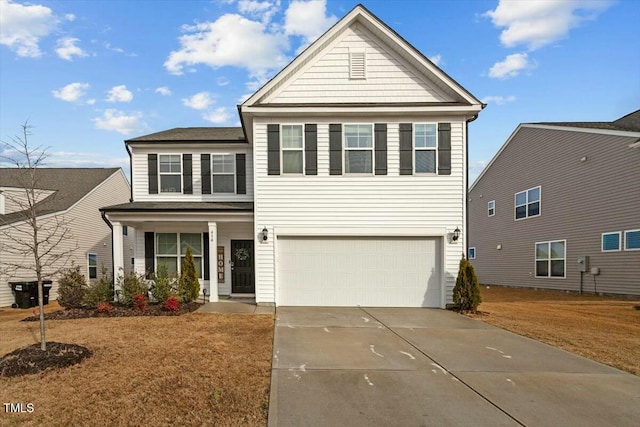 view of front of property with a garage