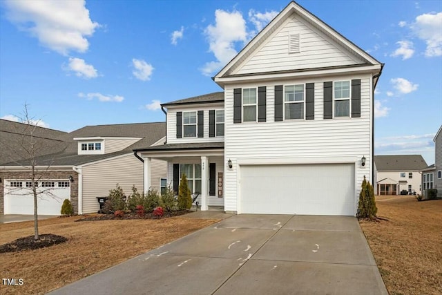 front facade featuring a garage and a front lawn