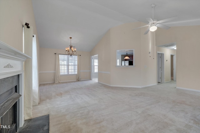 unfurnished living room featuring ceiling fan with notable chandelier, light carpet, and high vaulted ceiling