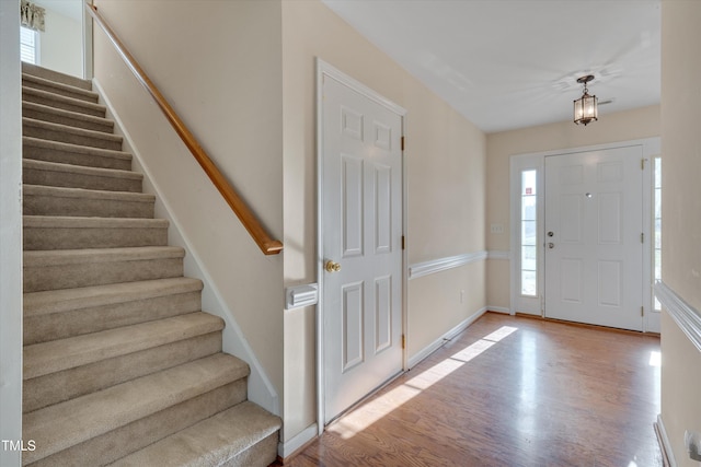 foyer with light hardwood / wood-style floors