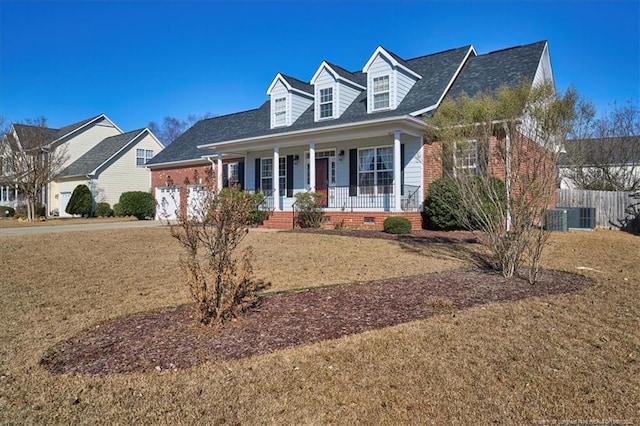 cape cod-style house with central AC unit, a garage, a front yard, and a porch