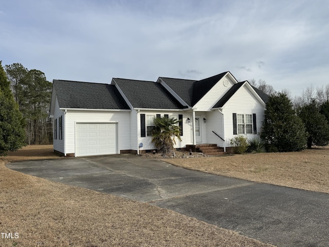 ranch-style home with a garage