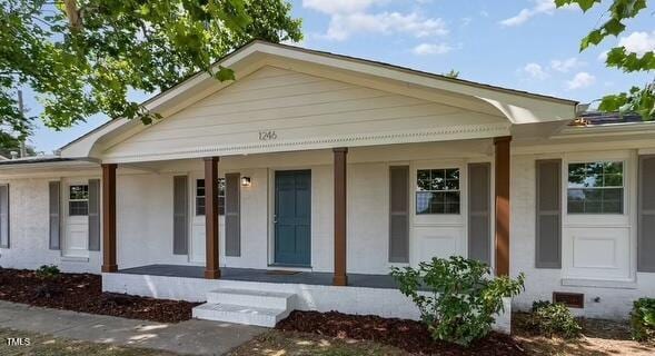 bungalow-style home with covered porch