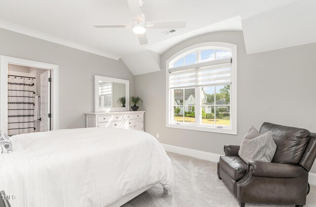 bedroom with ceiling fan, light carpet, baseboards, vaulted ceiling, and visible vents