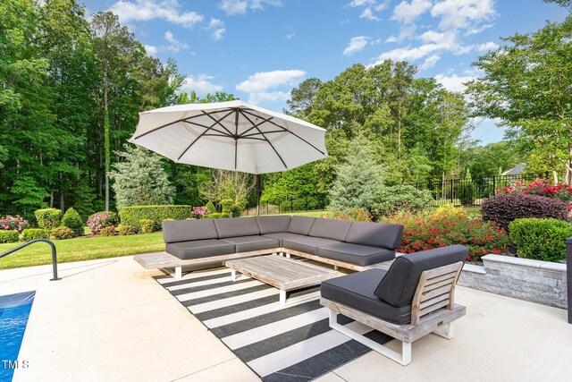 view of patio / terrace with fence and outdoor lounge area